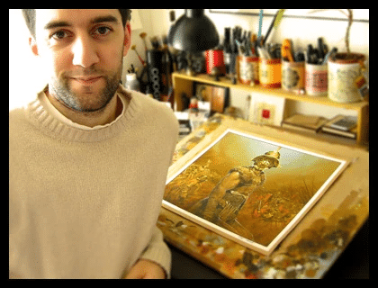 Vincent Dutrait dans son atelier avec une illustration